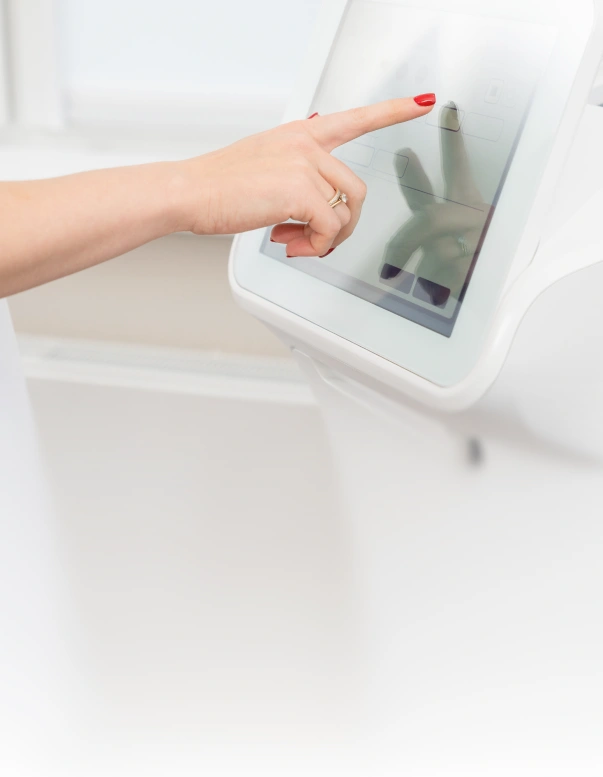 Patient check-in tablet being used at reception